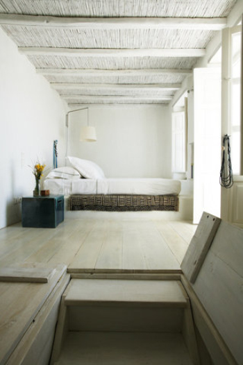 Spacious and bright white bedroom